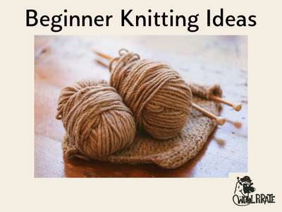 Image of a knit dishcloth with two balls of yarn that have been used