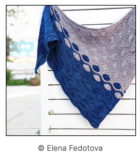 image of a two colours texture shawl that is crochet
