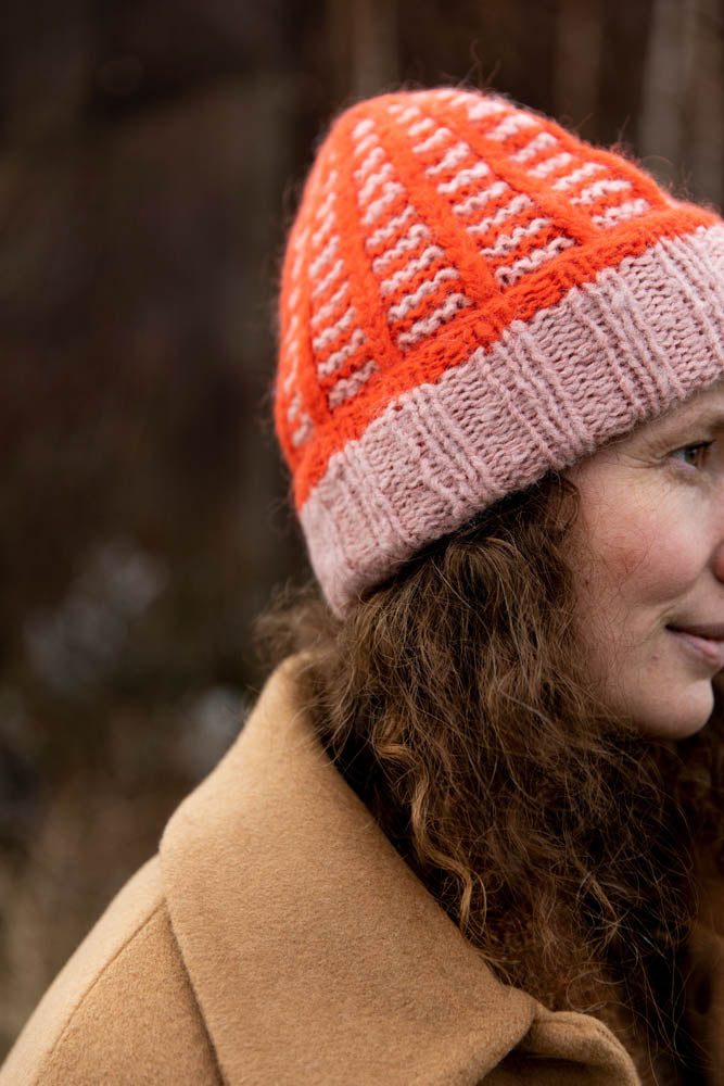 image of a knit hat being worn on a person outdoors