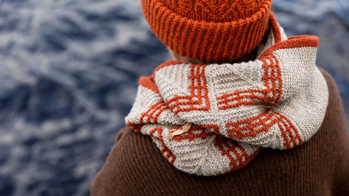 image of a knit colourwork scarf being worn on a person