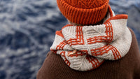 image of a knit colourwork scarf being worn on a person