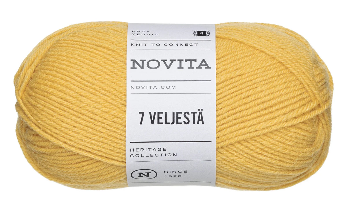 Yellow ball of Novita yarn with label on a white background