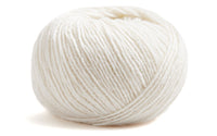 White skein of yarn on a white background