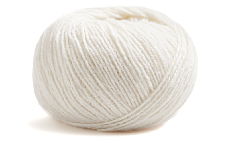 White skein of yarn on a white background