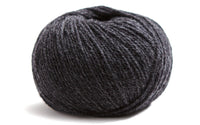dark grey ball of yarn on a white background