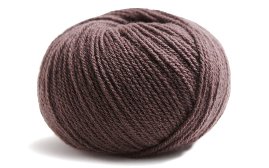 brown ball of yarn on a white background