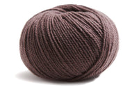 brown ball of yarn on a white background