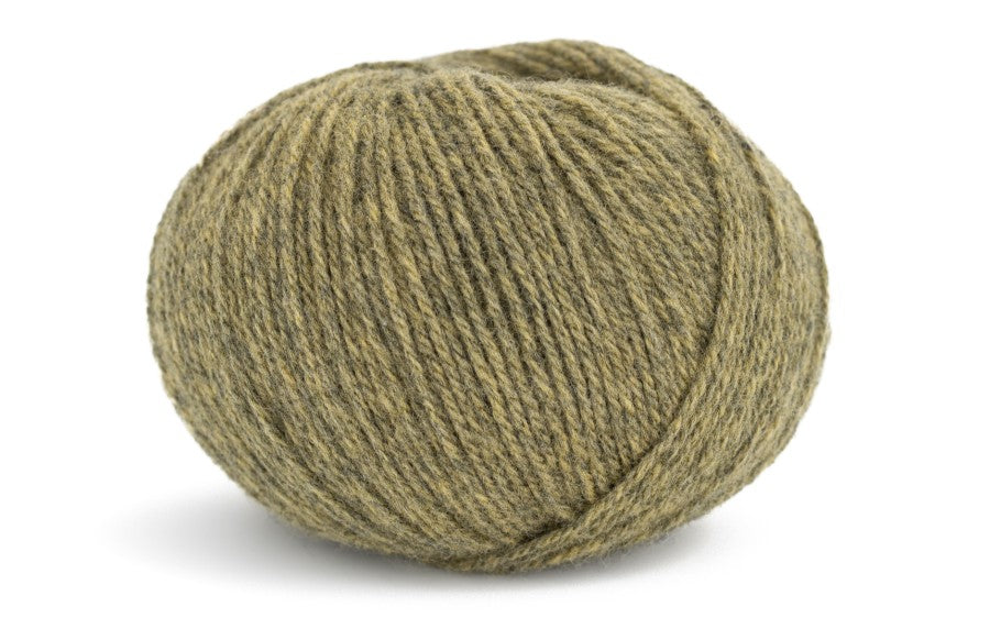 light greenish coloured ball of yarn on a white background
