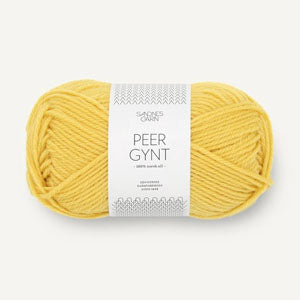 A ball of yellow yarn on a white background