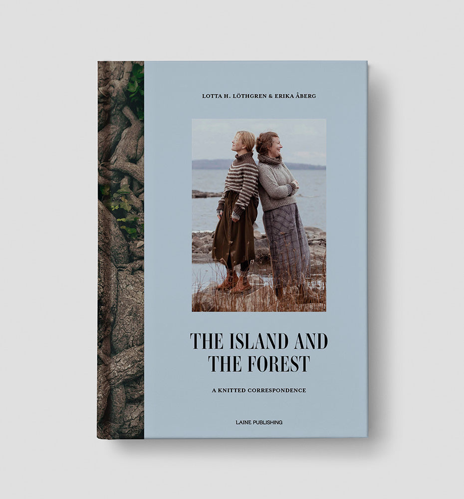 Book cover with two people by a lake, titled 'The Island and The Forest'.