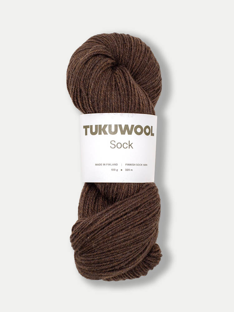 skein of brown yarn against a white background