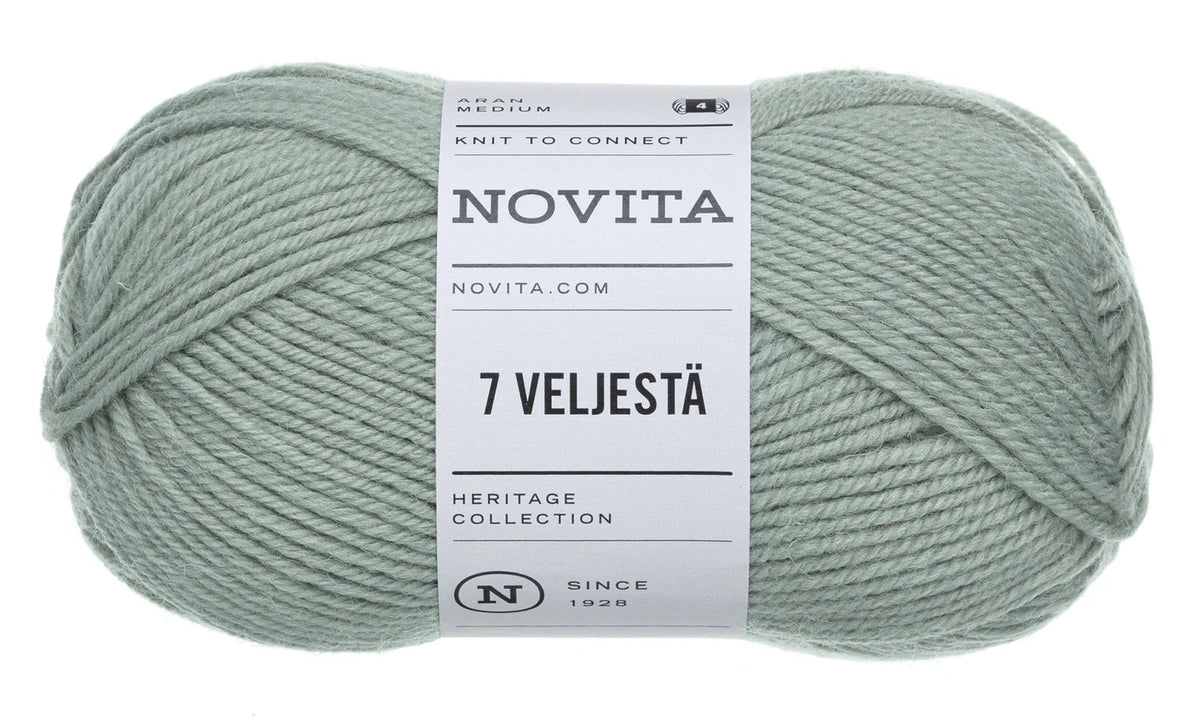 Green skein of yarn with Novita label on a white background
