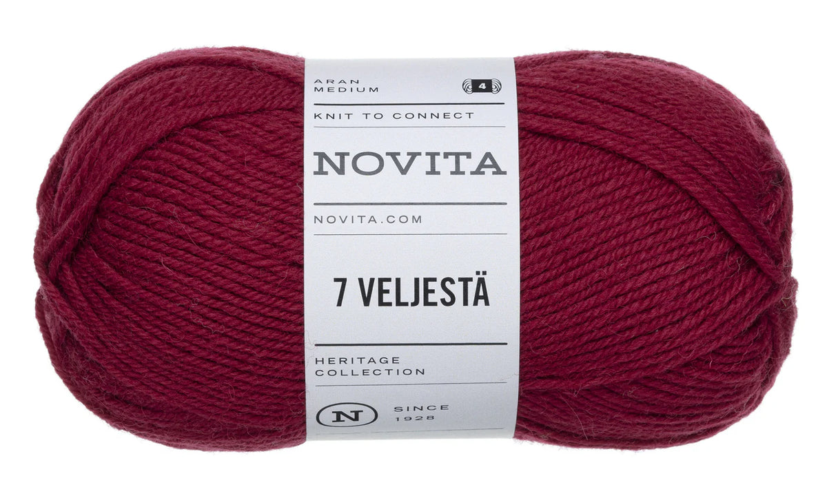 Red ball of yarn with a Novita label on a white background