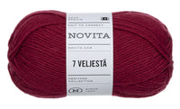 Red ball of yarn with a Novita label on a white background